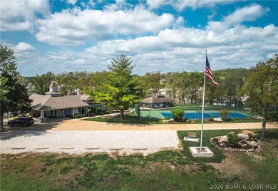 Enjoy stunning lake views from your screened-in deck overlooking - photo 49