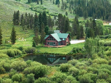 Set on 14 pristine acres along the Swan River, 2717 Tiger Road - photo 2