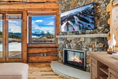 Set on 14 pristine acres along the Swan River, 2717 Tiger Road - photo 7