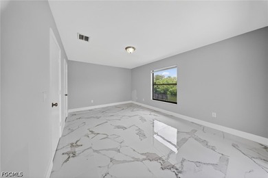 Fully remodeled waterfront home in Cape Coral featuring 3 - photo 15