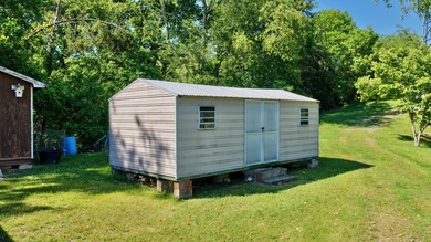 Welcome to The Hideaway! Charming brick ranch offering the - photo 17