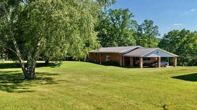 Welcome to The Hideaway! Charming brick ranch offering the - photo 18