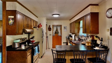 Welcome to The Hideaway! Charming brick ranch offering the - photo 30