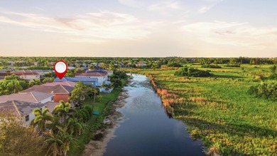Welcome to this elegant canal-front residence located in the - photo 33