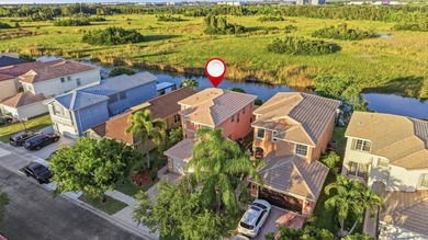 Welcome to this elegant canal-front residence located in the - photo 35