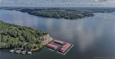 Lakefront Penthouse offers a rare 18 x 48 boat slip, partially - photo 40