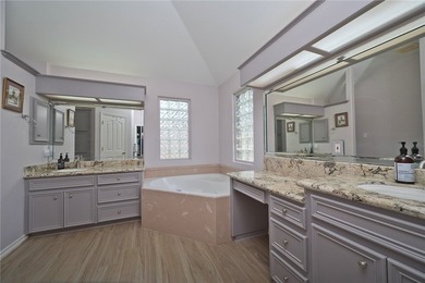 Step into this versatile 3-bedroom, 2-bath home in the highly - photo 11