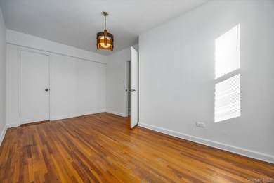243 McDonald Ave, apartment 3F, sits at the rear corner of the