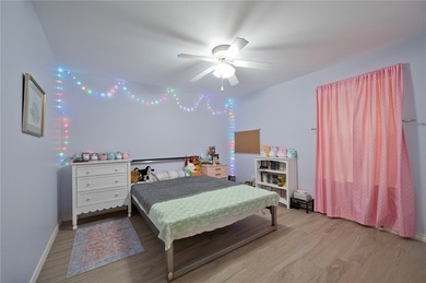 Step into this versatile 3-bedroom, 2-bath home in the highly - photo 14