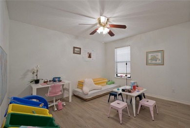 Step into this versatile 3-bedroom, 2-bath home in the highly - photo 15