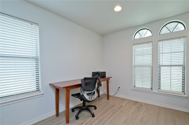 Step into this versatile 3-bedroom, 2-bath home in the highly - photo 19