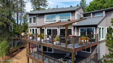 Beautifully remodeled 3-story home perched on Fernan Hill with - photo 1