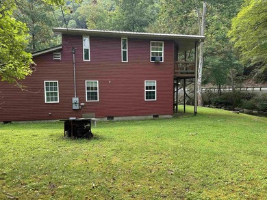 Riverfront retreat on 8 breathtaking acres! This beautiful home - photo 4