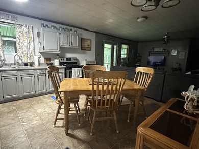 Riverfront retreat on 8 breathtaking acres! This beautiful home - photo 9