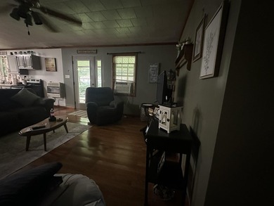 Riverfront retreat on 8 breathtaking acres! This beautiful home - photo 10