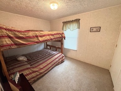Set on nearly 100 acres of beautiful Golden Pond with easy - photo 11