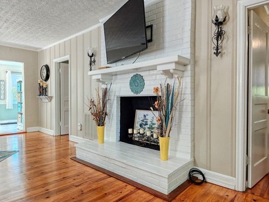 Set on a beautifully maintained 1.2 acre +/- lot, 195 Coast - photo 11
