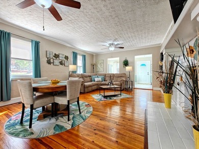 Set on a beautifully maintained 1.2 acre +/- lot, 195 Coast - photo 13