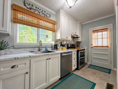 Set on a beautifully maintained 1.2 acre +/- lot, 195 Coast - photo 16