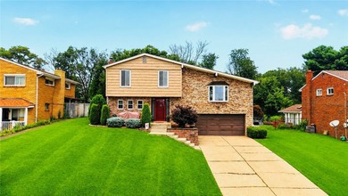Welcome to this well-maintained 3-bedroom multi-level home - photo 1