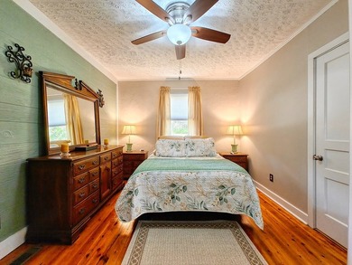 Set on a beautifully maintained 1.2 acre +/- lot, 195 Coast - photo 23