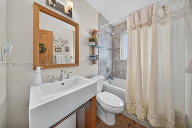 Beautifully renovated 3-bedroom, 3-bath residence in the - photo 14