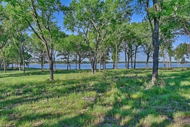 +/-325 acres with approximately 1 mile of frontage on Lake - photo 24