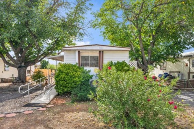 This spacious and exceptionally well-kept 2-bedroom, 1-bath home