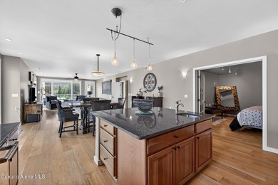Experience elevated riverfront-living in this beautifully - photo 8