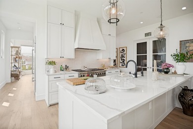 Barely lived in and impeccably maintained, this exceptional - photo 11