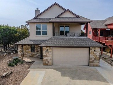 Experience elevated lake living at 185 Oyster Bay Drive, located