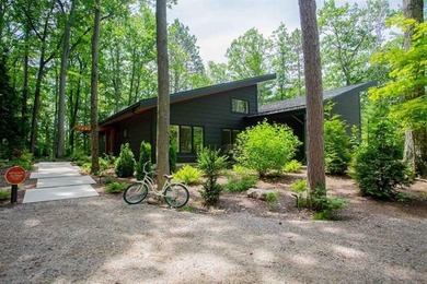 (private lake, pond, creek) Home For Sale in Almira Twp Michigan