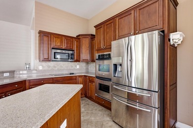 Enjoy serene pond and 7th fairway views from this beautifully - photo 18
