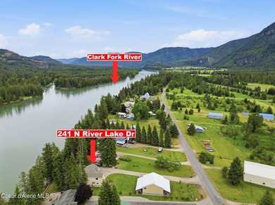 Your North Idaho riverfront dream starts here. Nestled along the - photo 2