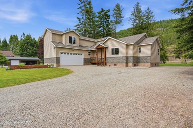Your North Idaho riverfront dream starts here. Nestled along the - photo 5