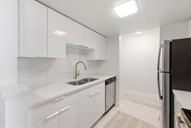 WELCOME to this beautiful maintained condo located in the heart - photo 12