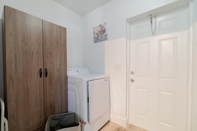Welcome to this charming 4-bedroom, 2-bath home located in the - photo 12