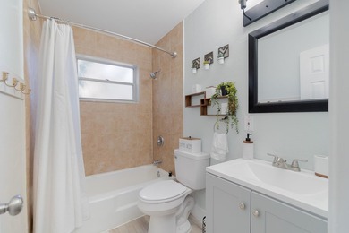 Welcome to this charming 4-bedroom, 2-bath home located in the - photo 18