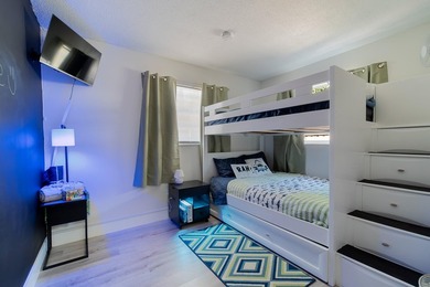 Welcome to this charming 4-bedroom, 2-bath home located in the - photo 21
