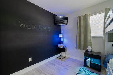Welcome to this charming 4-bedroom, 2-bath home located in the - photo 26