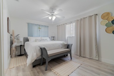 Welcome to this charming 4-bedroom, 2-bath home located in the - photo 28