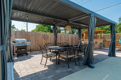 Welcome to this charming 4-bedroom, 2-bath home located in the - photo 38
