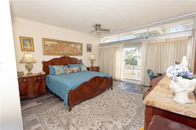 Very well-kept condo 2- bedroom 2 bath 2 cover parking garage on