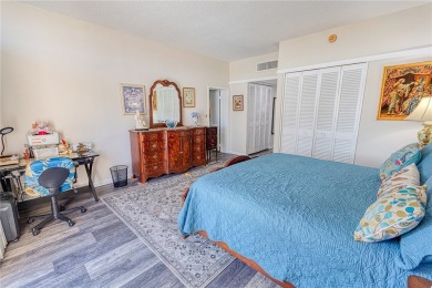 Very well-kept condo 2- bedroom 2 bath 2 cover parking garage on