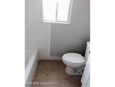 WHY RENT WHEN YOU CAN OWN? AFFORDABLE TOWNHOUSE IN MIDLAND BEACH - photo 13