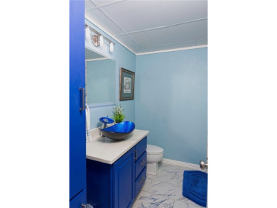 Very well-kept condo 2- bedroom 2 bath 2 cover parking garage on