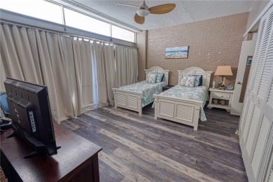 Very well-kept condo 2- bedroom 2 bath 2 cover parking garage on