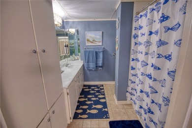 Very well-kept condo 2- bedroom 2 bath 2 cover parking garage on