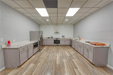 Very well-kept condo 2- bedroom 2 bath 2 cover parking garage on