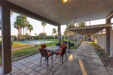 Very well-kept condo 2- bedroom 2 bath 2 cover parking garage on